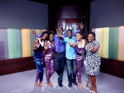 Stephanie Groves-McIntyre, Development Officer for the DeafKidz International programme, Advancing DeafKidz Jamaica!, and students from the Lister Mair/Gilby High School for the Deaf in the TV studio
